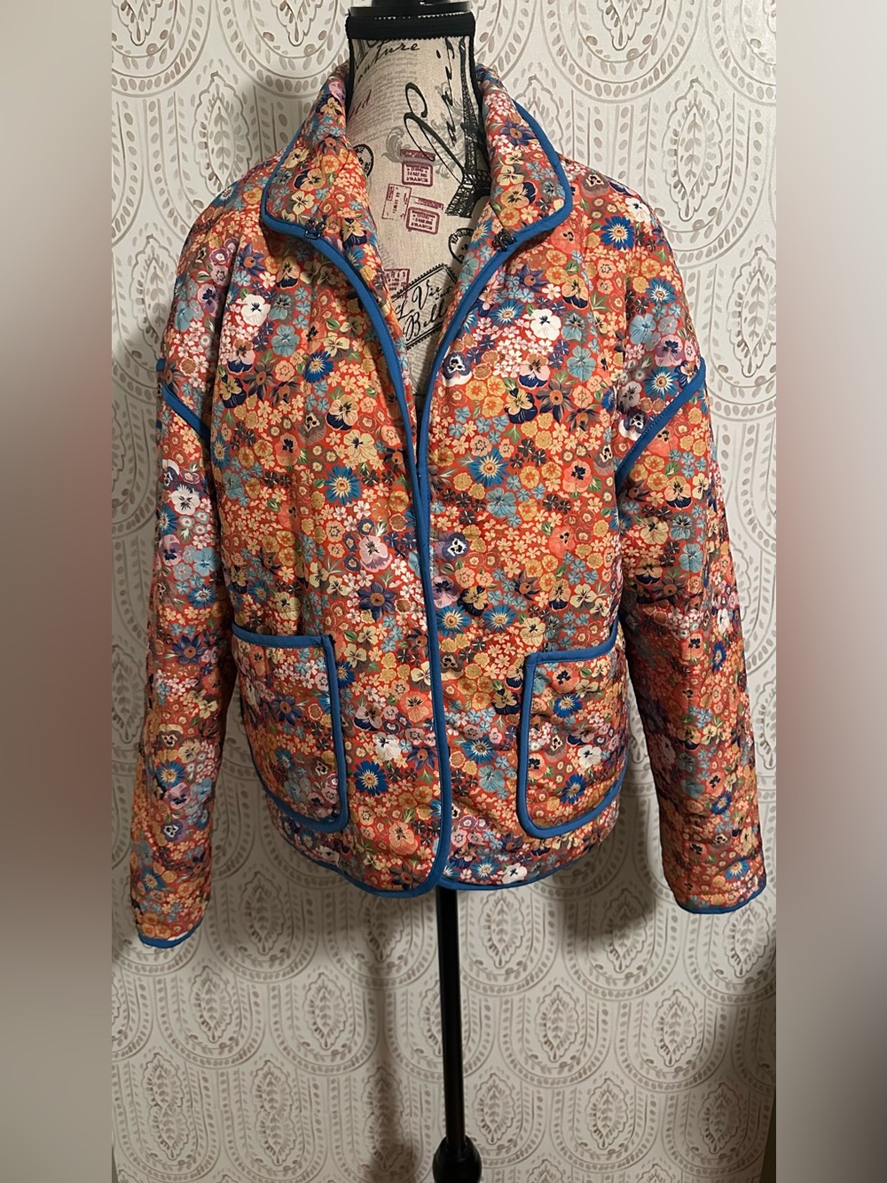 Amazon Quilted Floral Puffer Jacket in Orange with Blue Trim